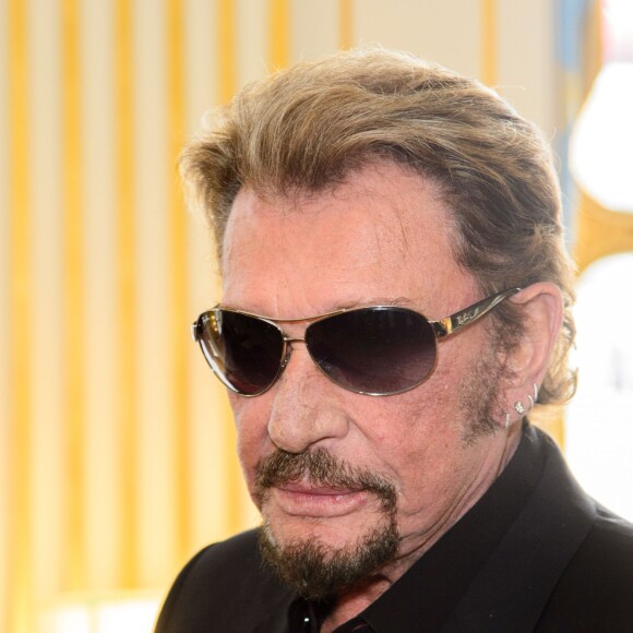 Johnny Hallyday - Remise de décoration de Commandeur de l'Ordre des Arts et des Lettres à Harvey Keitel au ministère de la culture à Paris le 13 octobre 2015.