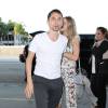 Matthew Bellamy et sa petite amie Elle Evans arrivent à l'aéroport de Los Angeles, le 13 octobre 2015