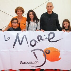 Exclusif - Jenifer Bartoli a tenu à apporter cette année encore son soutien à l'association 'La Marie Do' à Ajaccio en Corse le 10 octobre 2015. C'est sur la place Miot, à Ajaccio, que la chanteuse est venue rendre visite aux bénévoles et au public. De nombreux fans étaient présents pour tenter d'obtenir une photo ou un autographe de sa part mais également pour l'entendre chanter 'Ricordu', une chanson corse interprétée aux côtés de Laurent Buschini et extraite de l'album Corsu Mezu Mezu (duos corso-français). Jenifer a ensuite assisté au concert de l'école de chant Natale Luciani après une interview pour une radio locale.