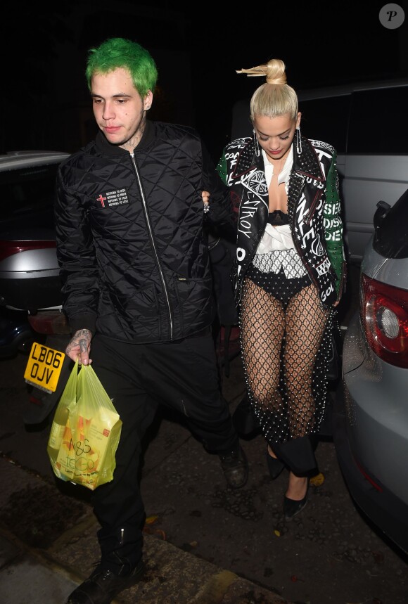 Rita Ora et son petit-ami Ricky Hil (Richard Hilfiger) sortent de la boîte de nuit "Cirque le Soir" vers 5h du matin à Londres, le 8 octobre 2014.