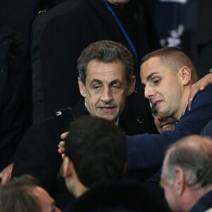 Nicolas Sarkozy pose pour un selfie au Parc des Princes le 21 octobre 2015 pour le match de Ligue des Champions PSG - Real Madrid. © Cyril Moreau / Bestimage