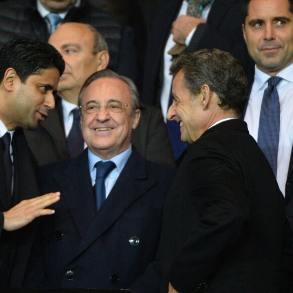 Nasser Al Khelaïfi et Florentino Perez, présidents respectivement du PSG et du Real Madrid, avec Nicolas Sarkozy au Parc des Princes le 21 octobre 2015 pour le match de Ligue des Champions PSG - Real Madrid.