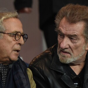 Daniel Hechter et Eddy Mitchell au Parc des Princes le 21 octobre 2015 pour le match de Ligue des Champions PSG - Real Madrid. © Cyril Moreau / Bestimage