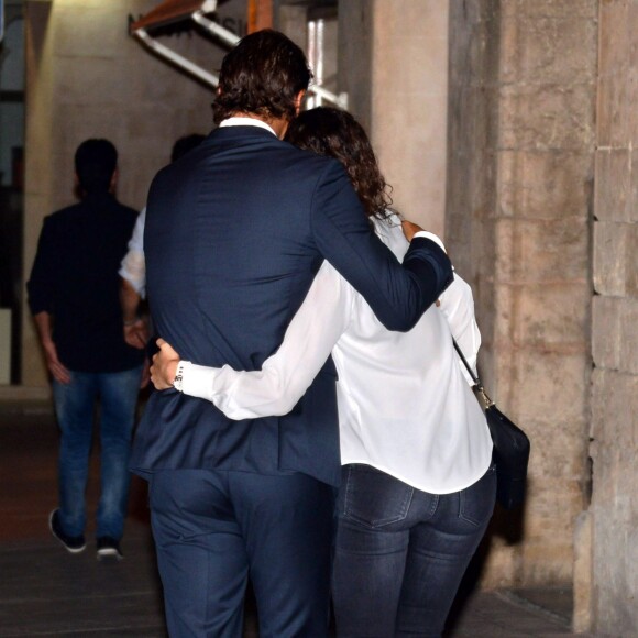 Rafael Nadal et sa compagne Xisca Perello lors des obsèques du pianiste Rafael Nadal, le grand-père du tennisman, en l'église Nuetra Senora de los Dolores à Manacor, sur l'île de Majorque le 8 septembre 2015