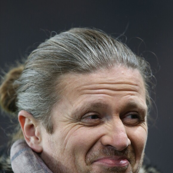 Emmanuel Petit lors du huitième de finale de Coupe de France entre le PSG et l'Olympique de Marseille au Parc des Princes à Paris le 27 février 2013