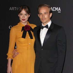 Dakota Johnson et son frère Jesse - Gala "The LACMA 2015 Art+Film" en l'honneur de James Turrell et Alejandro Inarritu à Los Angeles, le 7 novembre 2015.