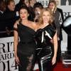 Kylie Minogue et Dannii Minogue - Arrivée des people à la soirée des "Brit Awards 2014" en partenariat avec MasterCard à Londres, le 19 février 2014.