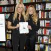 Pamela Anderson et Emma Dunlavey dédicacent leur livre 'RAW' à New York, le 22 septembre 2015