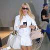 Pamela Anderson - People à l'aéroport de Toronto pendant le festival du film le 14 septembre 2015.