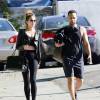 John Legend et sa femme Chrissy Teigen (enceinte) quittent une salle de sport à West Hollywood. Le 23 novembre 2015.