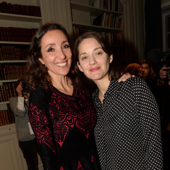 Marion Cotillard, Naziha Mestaoui (artiste qui métamorphose la Tour Eiffel en forêt de lumière) - Inauguration du projet "1 Heart 1 Tree" qui illumine la Tour Eiffel lors de la COP21 à la Fondation Mona Bismarck à Paris le 29 novembre 2015. © Rachid Bellak
