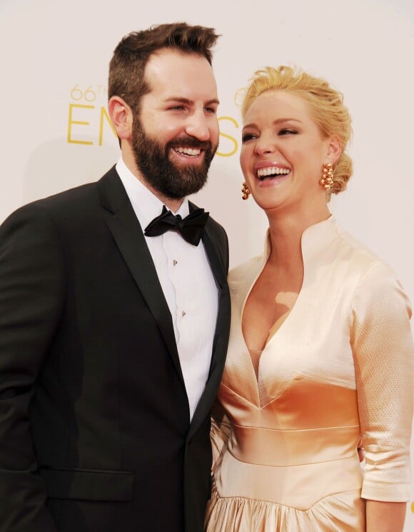 Katherine Heigl et son mari Josh Kelley arrivant à la 66ème cérémonie annuelle des Emmy Awards au Nokia Theatre à Los Angeles, le 25 août 2014.