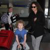 Minnie Driver et son fils Henry arrivent à l'aéroport LAX de Los Angeles. Le 14 juillet 2015