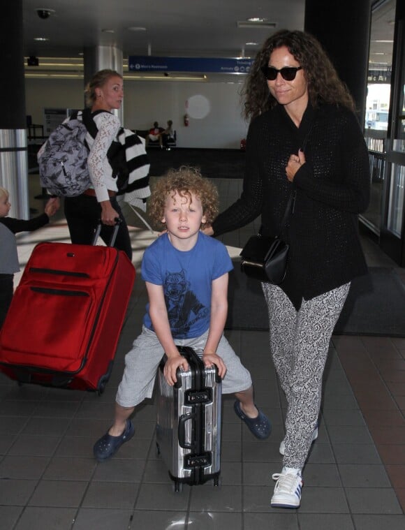 Minnie Driver et son fils Henry arrivent à l'aéroport LAX de Los Angeles. Le 14 juillet 2015