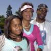 Whitney Houston, son ex-mari Bobby Brown et leur fille Bobbi Kristina à Disneyland, le 7 août 2004