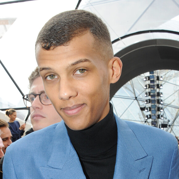 Stromae à la sortie du défilé de mode "Louis Vuitton", collection prêt-à-porter automne-hiver 2015/2016, à Paris. Le 11 mars 2015