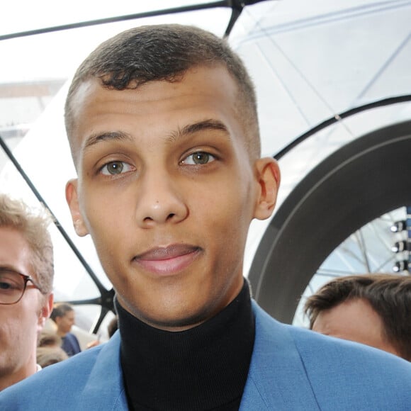 Stromae à la sortie du défilé de mode "Louis Vuitton", collection prêt-à-porter automne-hiver 2015/2016, à Paris. Le 11 mars 2015