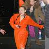 Miley Cyrus sortant d'une fête vêtue d'une combinaison orange à New York le 28 novembre 2015. © CPA/Bestimage