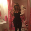 Mariah Carey dans son top bustier semble avoir perdu quelques kilos / photo postée sur Instagram au mois de décembre 2015.