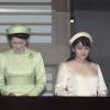 Les princesses Kako et Mako d'Akishino avec leur mère la princesse Kiko lors de la célébration du 82e anniversaire de l'empereur Akihito du Japon, le 23 décembre 2015 au palais impérial à Tokyo.