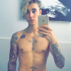 Justin Bieber torse nu lors de ses vacances avec Hailey Baldwin / photo postée sur Instagram, le 29 décembre 2015.