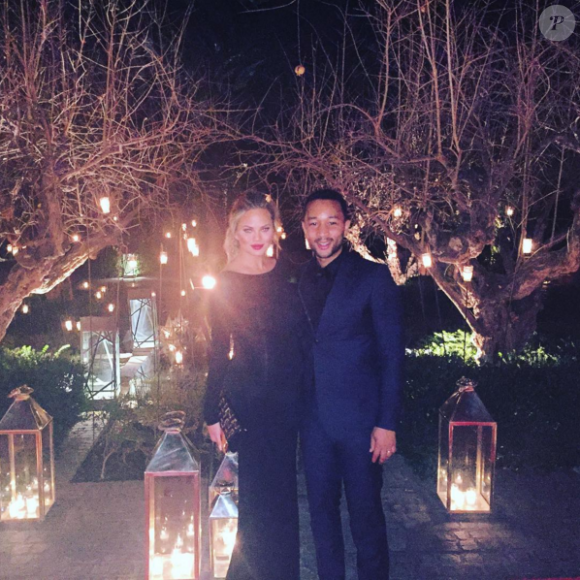 Chrissy Teigen et John Legend, sur leur 31 pour fêter le Nouvel An. Photo publiée le 1er janvier 2016.