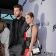 Liam Hemsworth et Miley Cyrus - Premiere du film "Paranoia" a Los Angeles, le 8 aout 2013.
