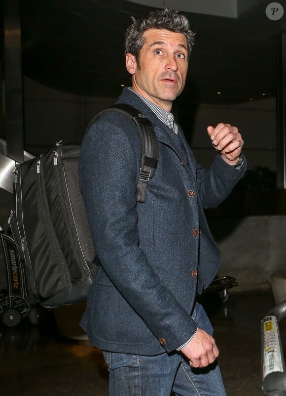Patrick Dempsey arrive à l'aéroport LAX de Los Angeles le 21 décembre 2015