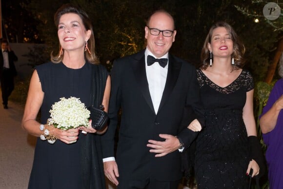 La Princesse Caroline de Hanovre, le prince Albert II de Monaco et Charlotte Casiraghi lors du dîner de charité organisé par les Amis du Nouveau Musée National à la Villa Paloma, Monaco le 17 septembre 2013.