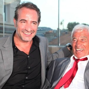 Exclusif - Jean Dujardin, Jean-Paul Belmondo - Soirée de Gala caritative au profit de l'association "Des Cantines Scolaires pour les Enfants du Sahel" à Cannes au Five Seas Hotel, le 31 mai 2014.