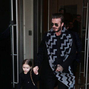 David Beckham et sa fille Harper à la sortie de l'hôtel à New York, pour se rendre au défilé de mode de Victoria Beckham. Le 14 février 2016