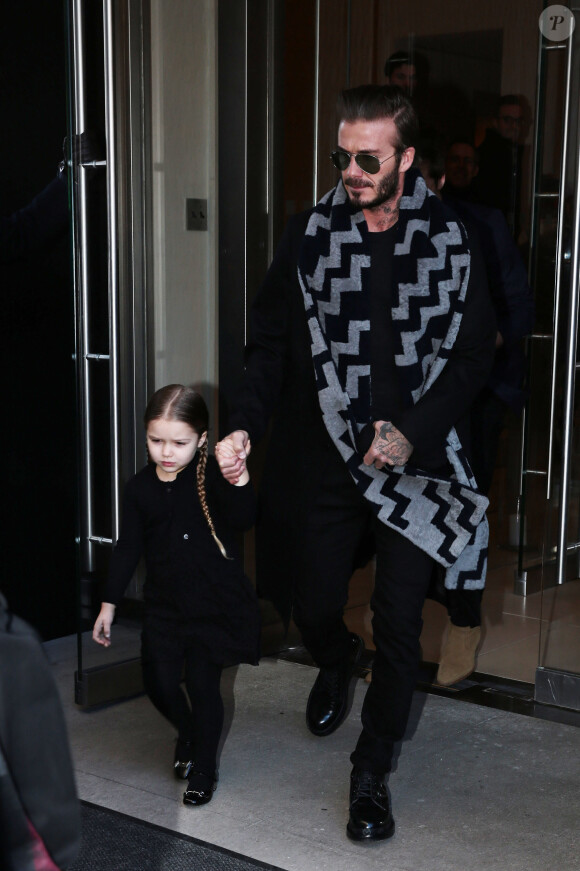 David Beckham et sa fille Harper à la sortie de l'hôtel à New York, pour se rendre au défilé de mode de Victoria Beckham. Le 14 février 2016