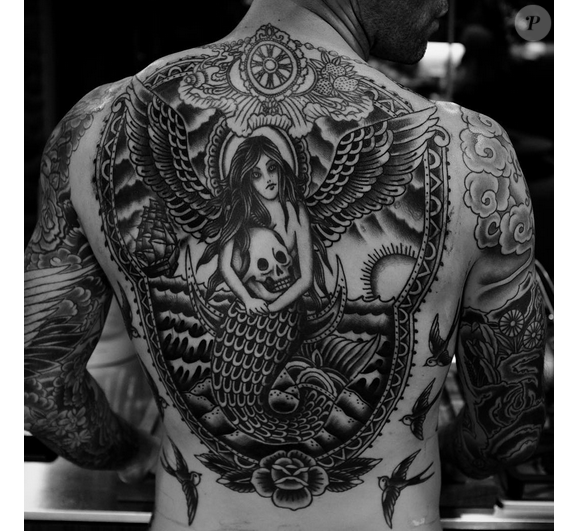 Adam Levine dévoile une photo de son nouveau tatouage dans le dos en forme de sirène. Photographie publiée sur Instagram, le 25 février 2016.