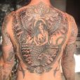 Adam Levine dévoile un cliché de son nouveau tatouage dans le dos en forme de sirène. Photo publiée sur Instagram, le 25 février 2016.