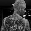 Adam Levine dévoile une photo de son nouveau tatouage dans le dos en forme de sirène. Photo publiée sur Instagram, le 25 février 2016.
