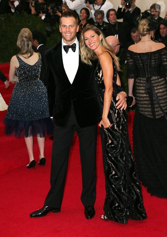 Tom Brady et sa femme Gisele Bündchen à la Soirée du Met Ball / Costume Institute Gala 2014: "Charles James: Beyond Fashion" à New York. Le 5 mai 2014.