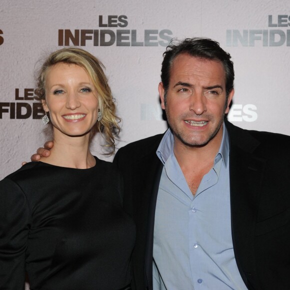 Alexandra Lamy et Jean Dujardin lors de l'avant-premiere des Infidèles à Paris le 14 fevrier 2012