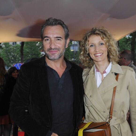 Jean Dujardin et Alexandra Lamy - Première de Un bonheur n'arrive jamais seul, à Paris, le 15 juin 2012