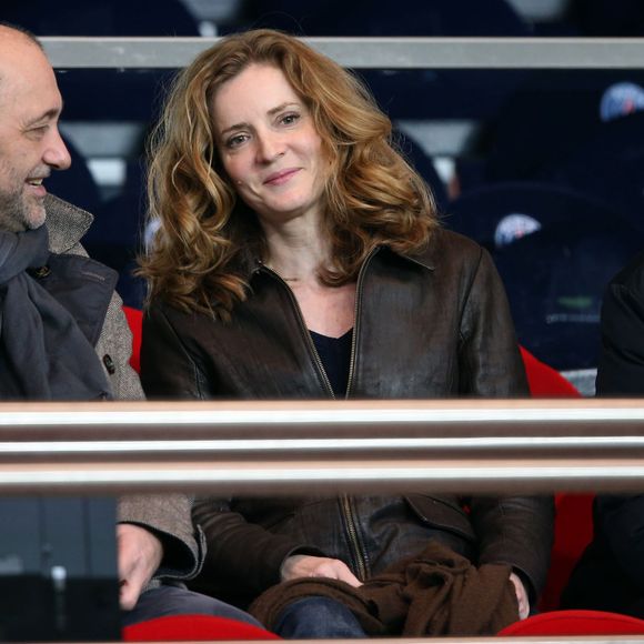 Nathalie Kosciusko-Morizet et son mari Jean-Pierre-Philippe lors du match de football PSG contre Lille, au parc des Princes à Paris le 22 décembre 2013.