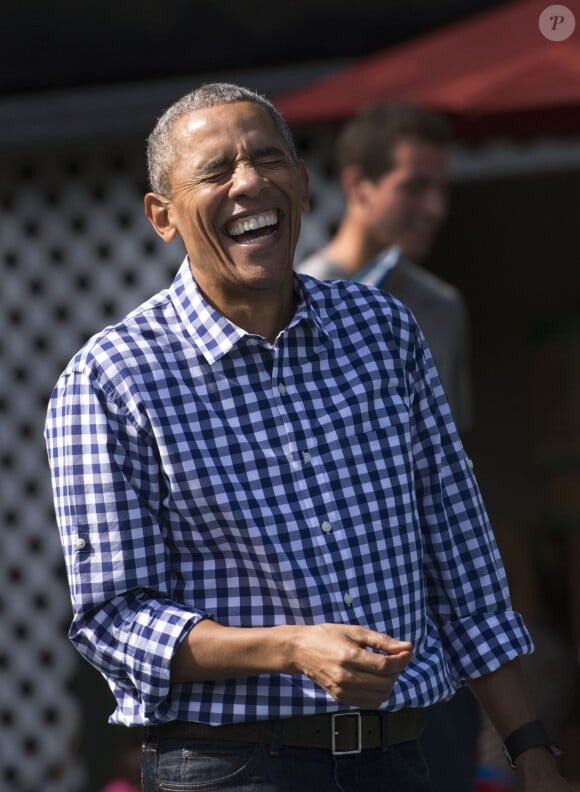 Barack Obama hilare lors de la traditionnelle chasse aux oeufs de Pâques de la Maison Blanche à Washington, le 28 mars 2016.