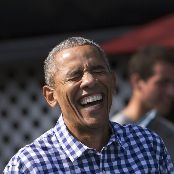Barack Obama hilare lors de la traditionnelle chasse aux oeufs de Pâques de la Maison Blanche à Washington, le 28 mars 2016.