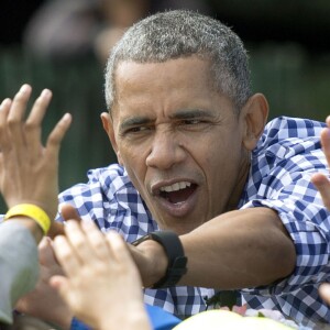 Barack Obama lors de la traditionnelle chasse aux oeufs de Pâques de la Maison Blanche à Washington, le 28 mars 2016.