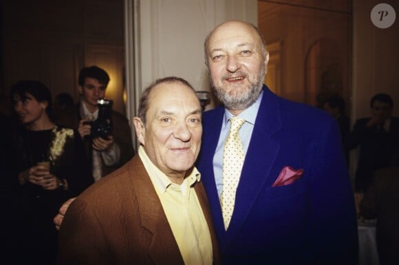 Jean-Pierre Coffe avec Jean Carmet en 1989 lors d'un cocktail pour la sortie de son livre Le Bon Vivre.