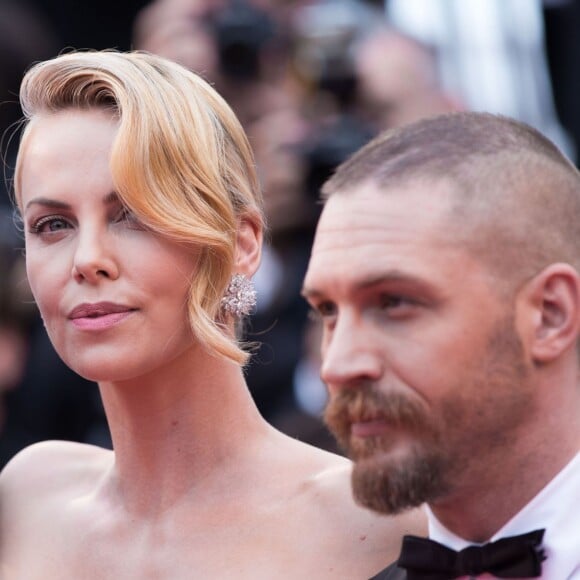 Charlize Theron, Tom Hardy - Montée des marches du film "Mad Max : Fury Road" lors du 68e Festival International du Film de Cannes, le 14 mai 2015.