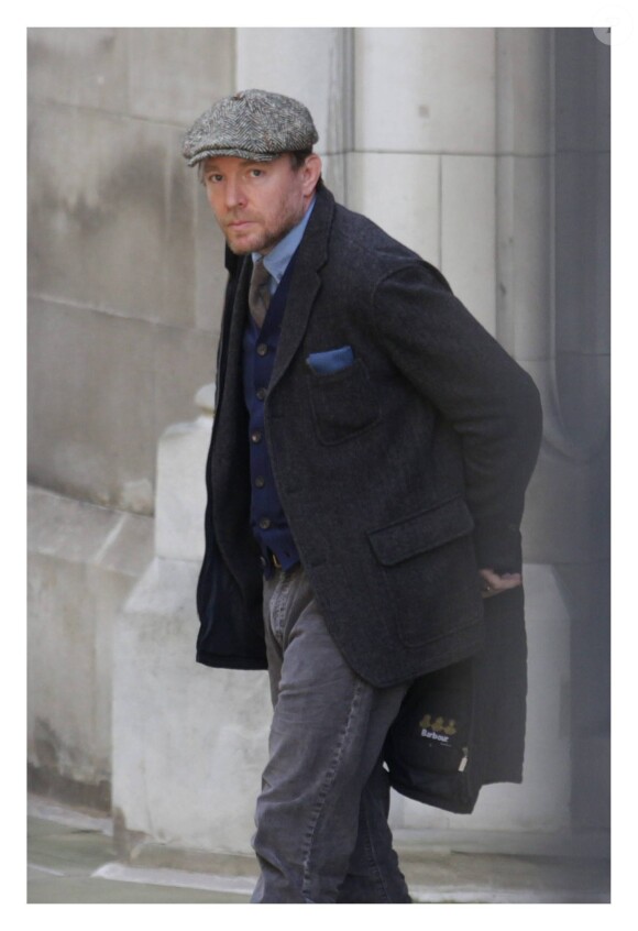 Guy Ritchie à la sortie de la Haute Cour de justice à Londres le 3 mars 2016