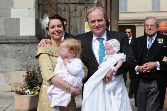Le prince Carlos de Bourbon-Parme et la princesse Annemarie lors du baptême de leur fille la princesse Luisa le 5 avril 2014 à Plaisance.
