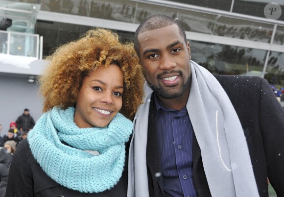Teddy Riner et sa compagne Luthna à l'Hippodrome de Paris-Vincennes pour la journée en soutien aux maladies rares, le dimanche 20 janvier 2013