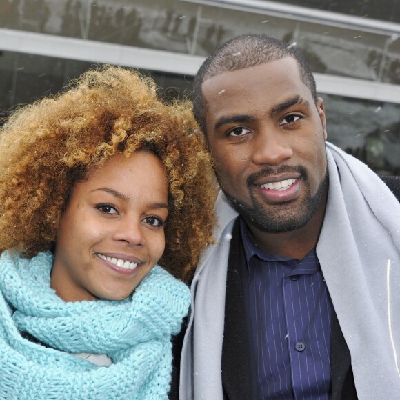 Teddy Riner et sa compagne Luthna à l'Hippodrome de Paris-Vincennes pour la journée en soutien aux maladies rares, le dimanche 20 janvier 2013