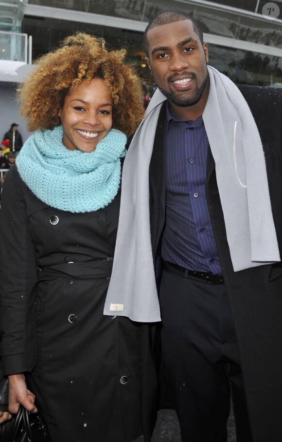 Teddy Riner et sa compagne Luthna à l'Hippodrome de Paris-Vincennes pour la journée en soutien aux maladies rares, le dimanche 20 janvier 2013