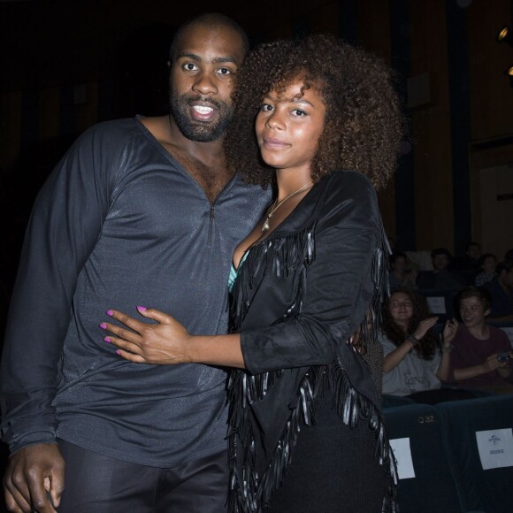 Teddy Riner et sa compagne Luthna à la première du film "Jurassic World" à l'UGC Normandie à Paris le 29 mai 2015